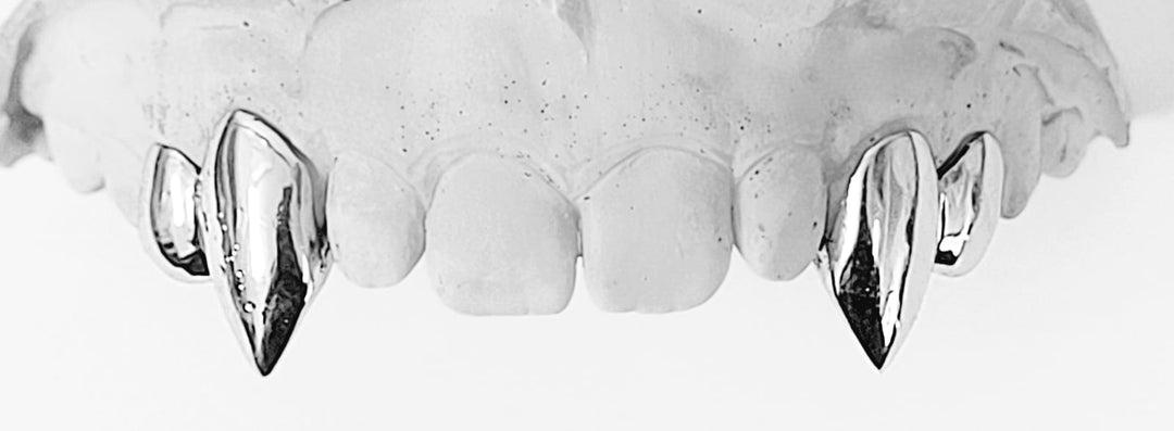 Two Sharp Fangs & Two Solid Caps