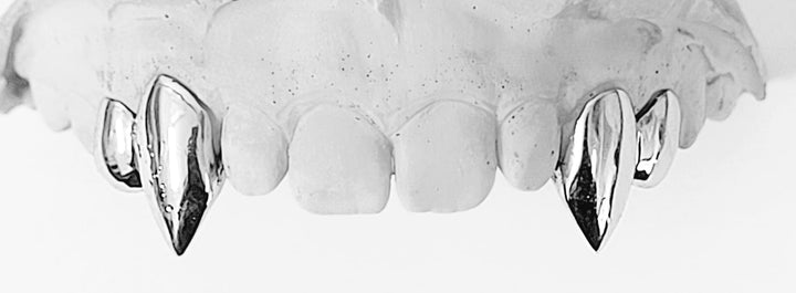 Two Sharp Fangs & Two Solid Caps