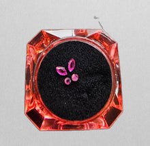 Load image into Gallery viewer, Butterfly Tooth Gem in purplish pink colour
